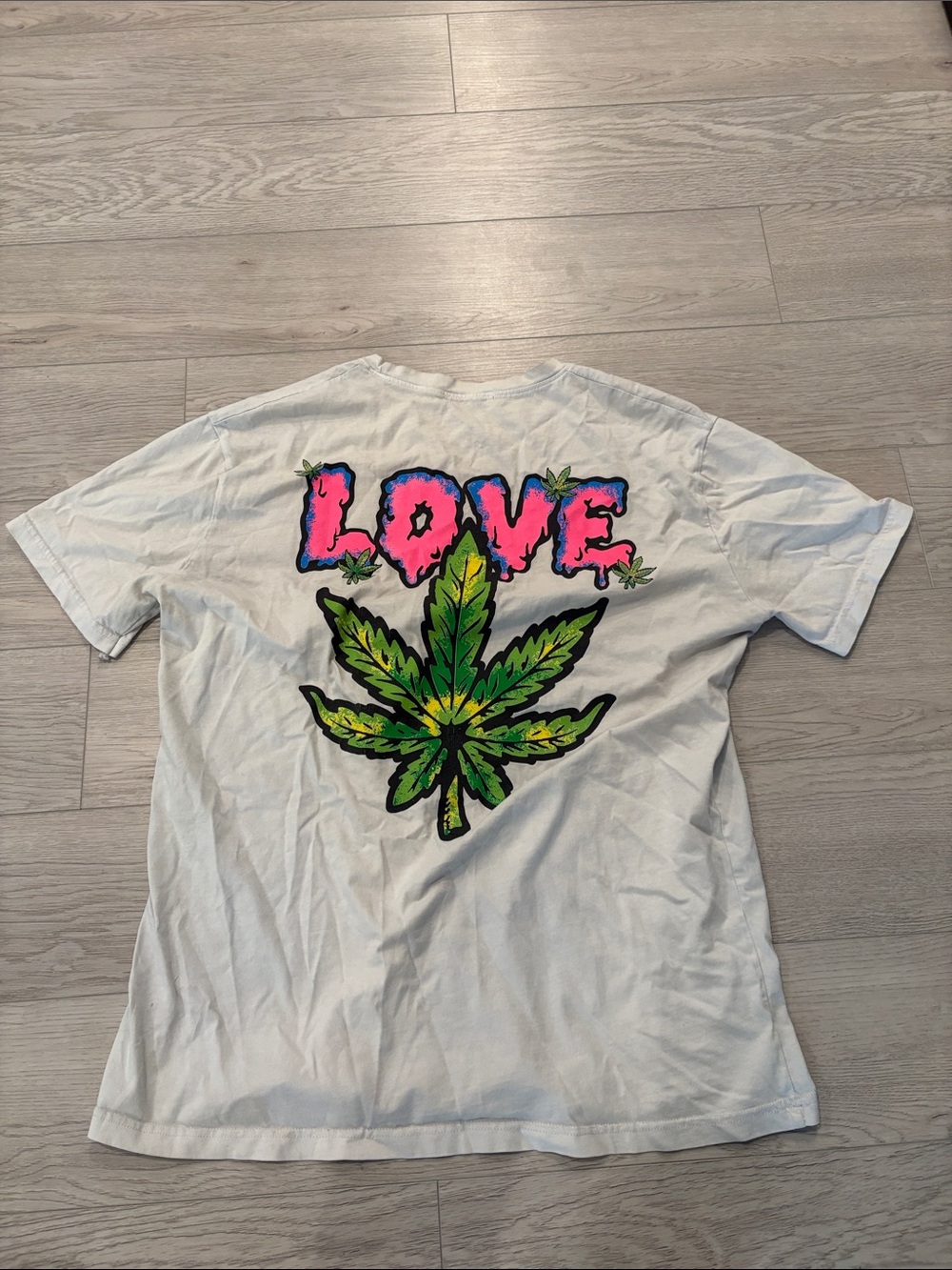 Alcott White Tee with Pink LOVE and Green Leaf Graphic